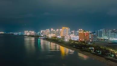 4k航拍三亚椰梦长廊夜景延时城市风光视频的预览图